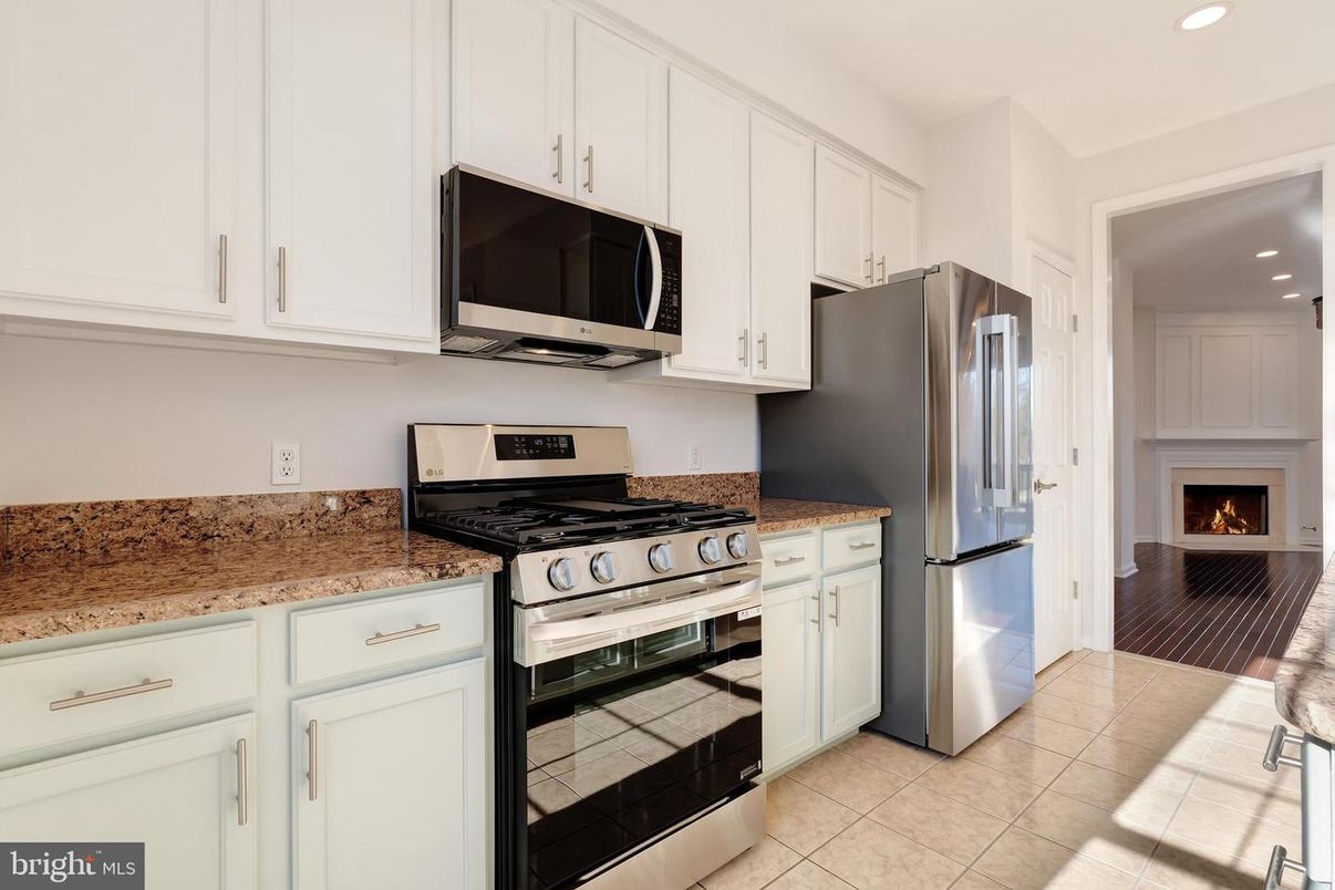 Fireplace, Interior, Kitchen, Recessed Lighting, Stainless Steel Appliances