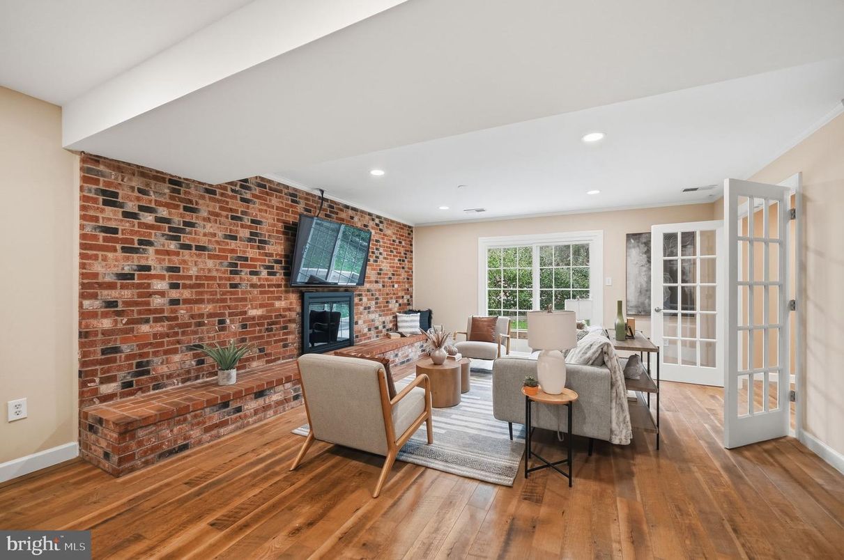 Fireplace, Interior, Living room, Recessed Lighting, Stone Walls, Wood Texture Flooring