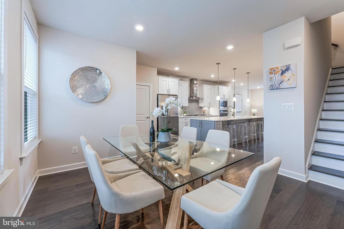 Dining room, Interior, Kitchen, Pendant Lights, Recessed Lighting, Stainless Steel Appliances, Wood Texture Flooring