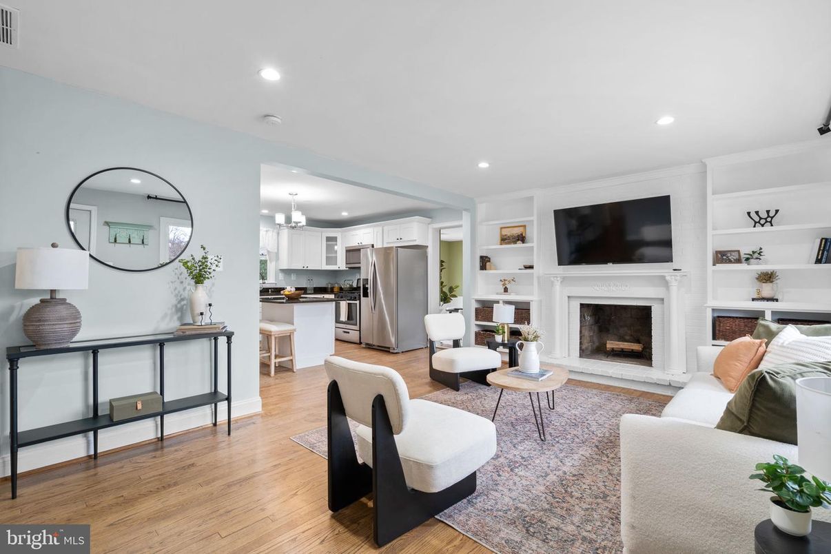 Fireplace, Interior, Kitchen, Living room, Pendant Lights, Recessed Lighting, Stainless Steel Appliances, Wood Texture Flooring