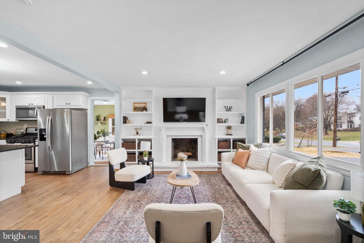 Dining room, Fireplace, Interior, Kitchen, Living room, Recessed Lighting, Stainless Steel Appliances, Wood Texture Flooring