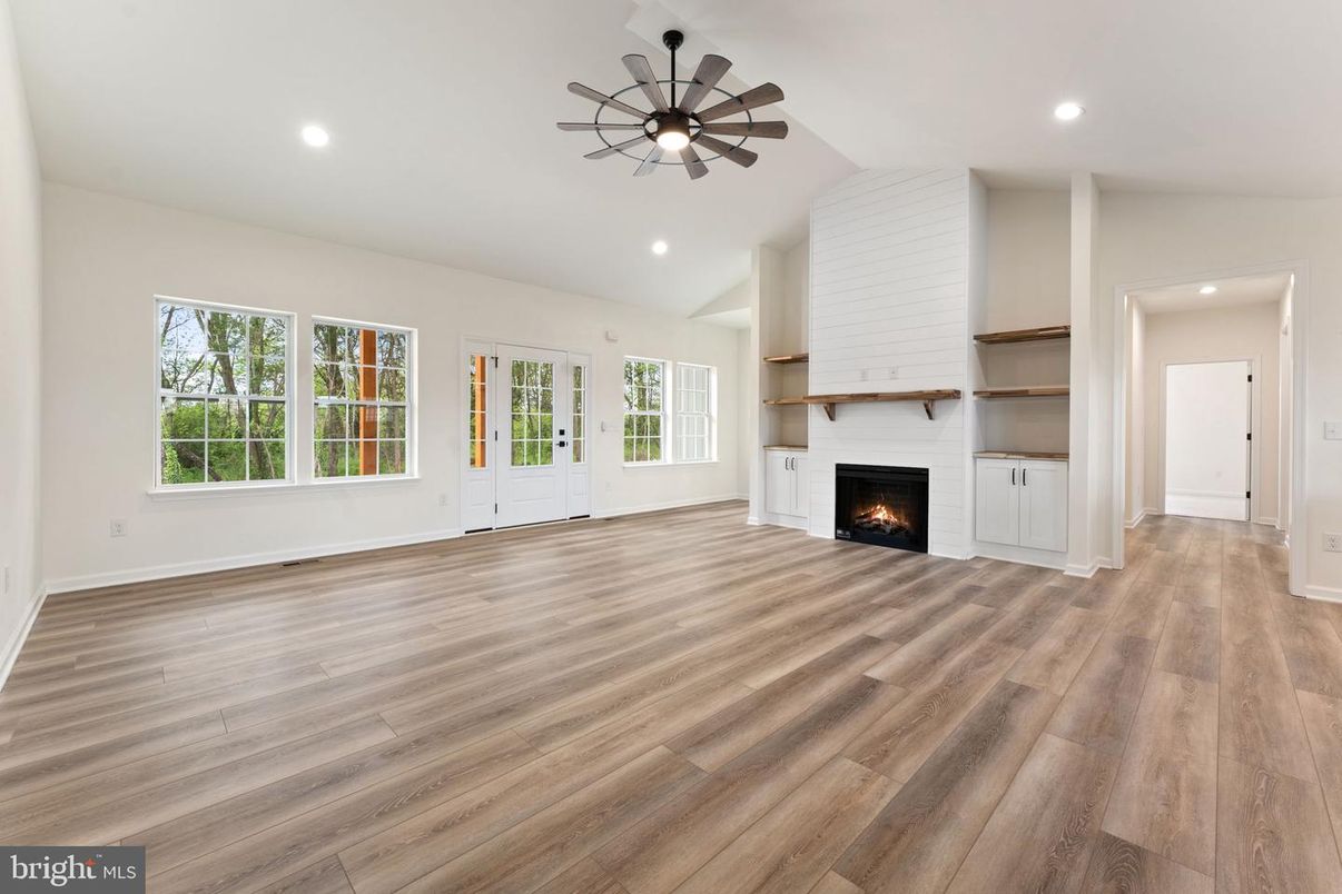 Empty room, Fireplace, Interior, Recessed Lighting, Wood Texture Flooring