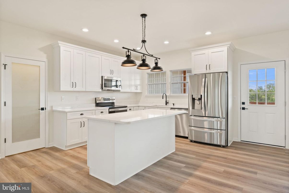 Interior, Kitchen, Pendant Lights, Recessed Lighting, Stainless Steel Appliances, Wood Texture Flooring