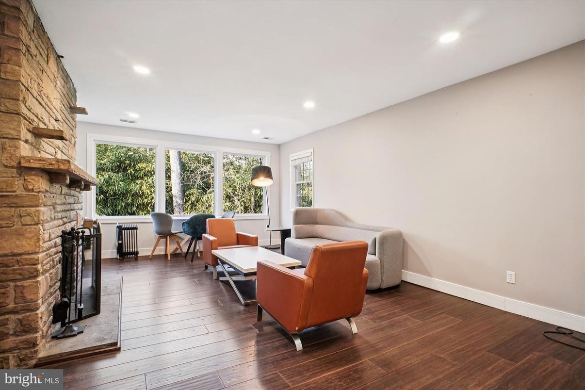 Fireplace, Interior, Living room, Recessed Lighting, Stone Walls, Wood Texture Flooring