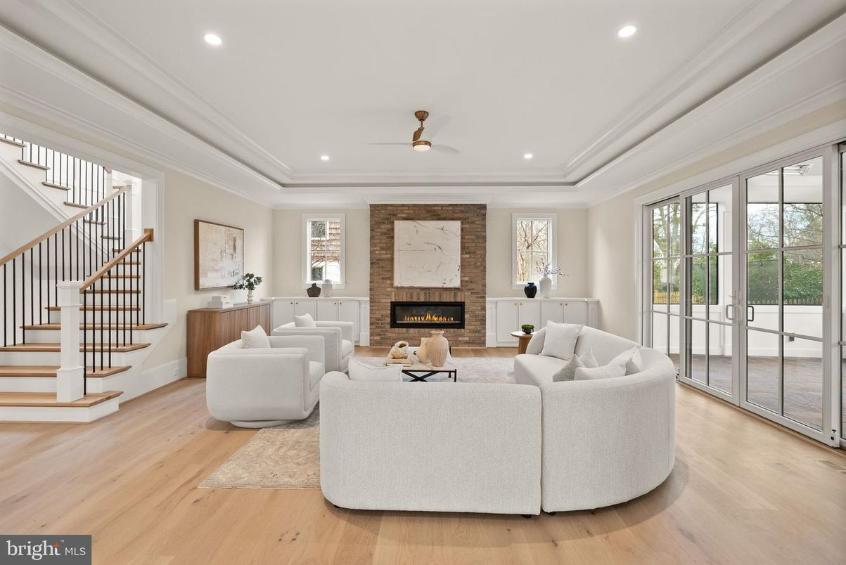 Fireplace, Interior, Living room, Recessed Lighting, Stone Walls, Wood Texture Flooring