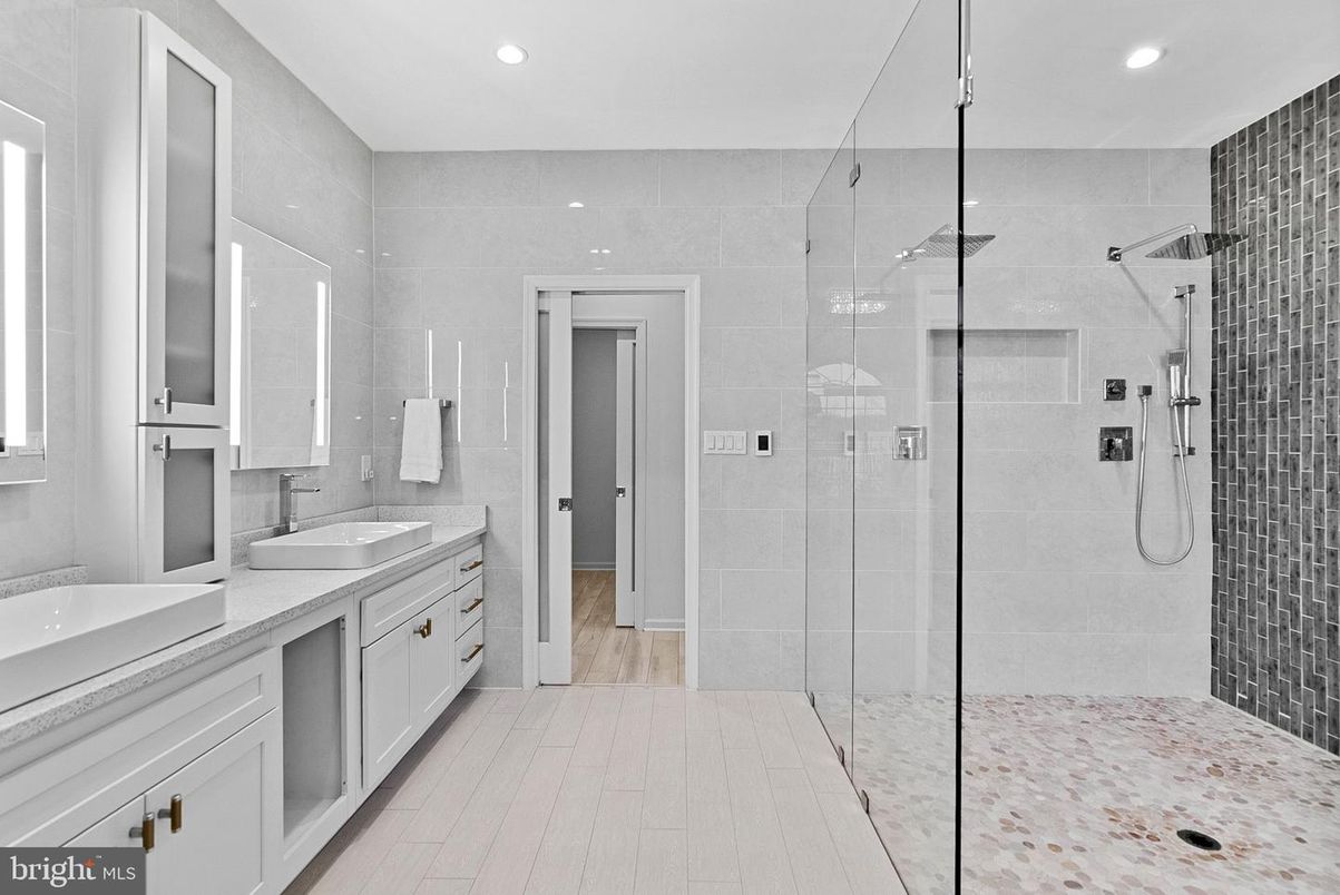 Bathroom, Dual Sink Vanities, Glass Shower, Interior, Recessed Lighting, Wood Texture Flooring