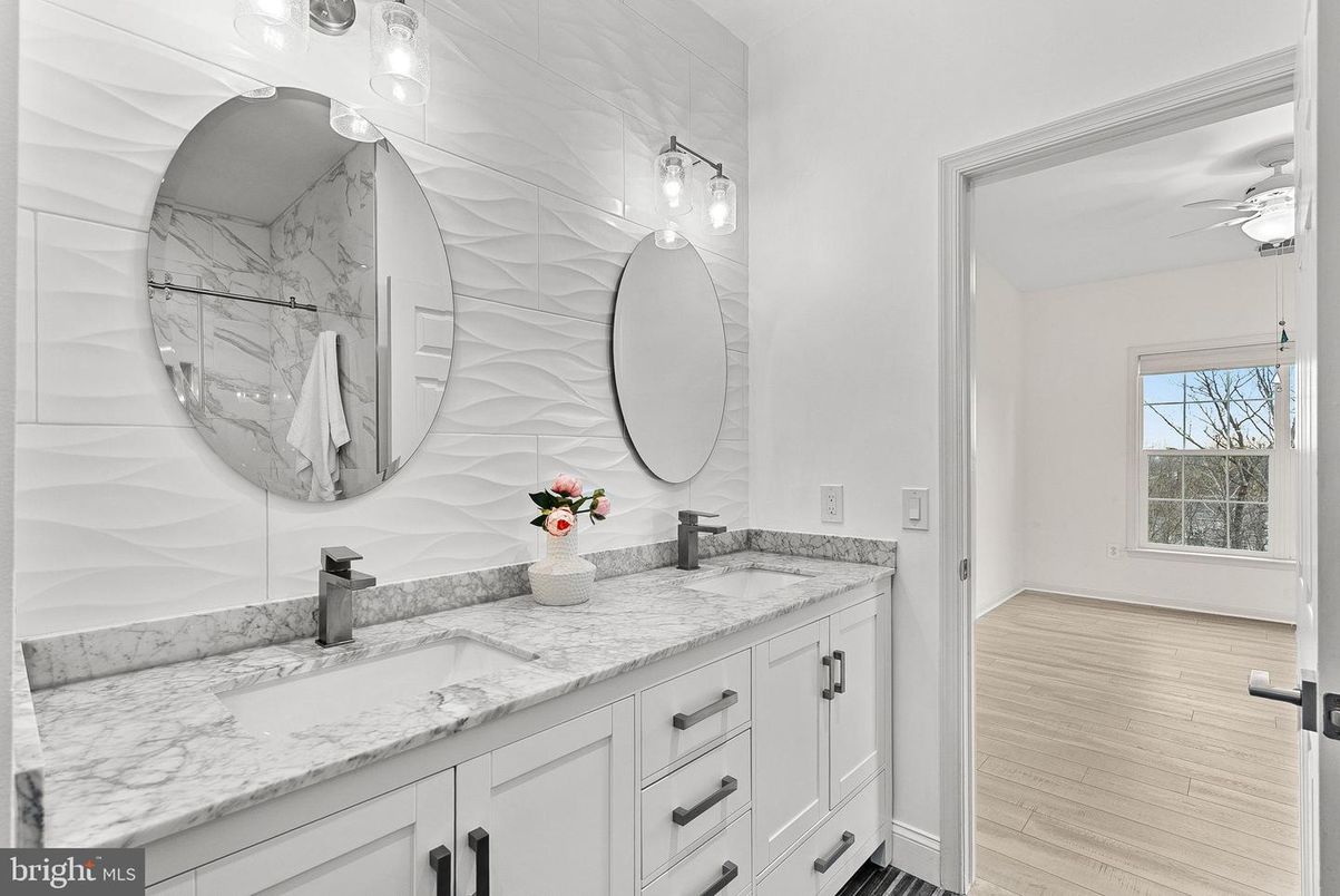 Bathroom, Dual Sink Vanities, Interior, Marble Walls, Wood Texture Flooring