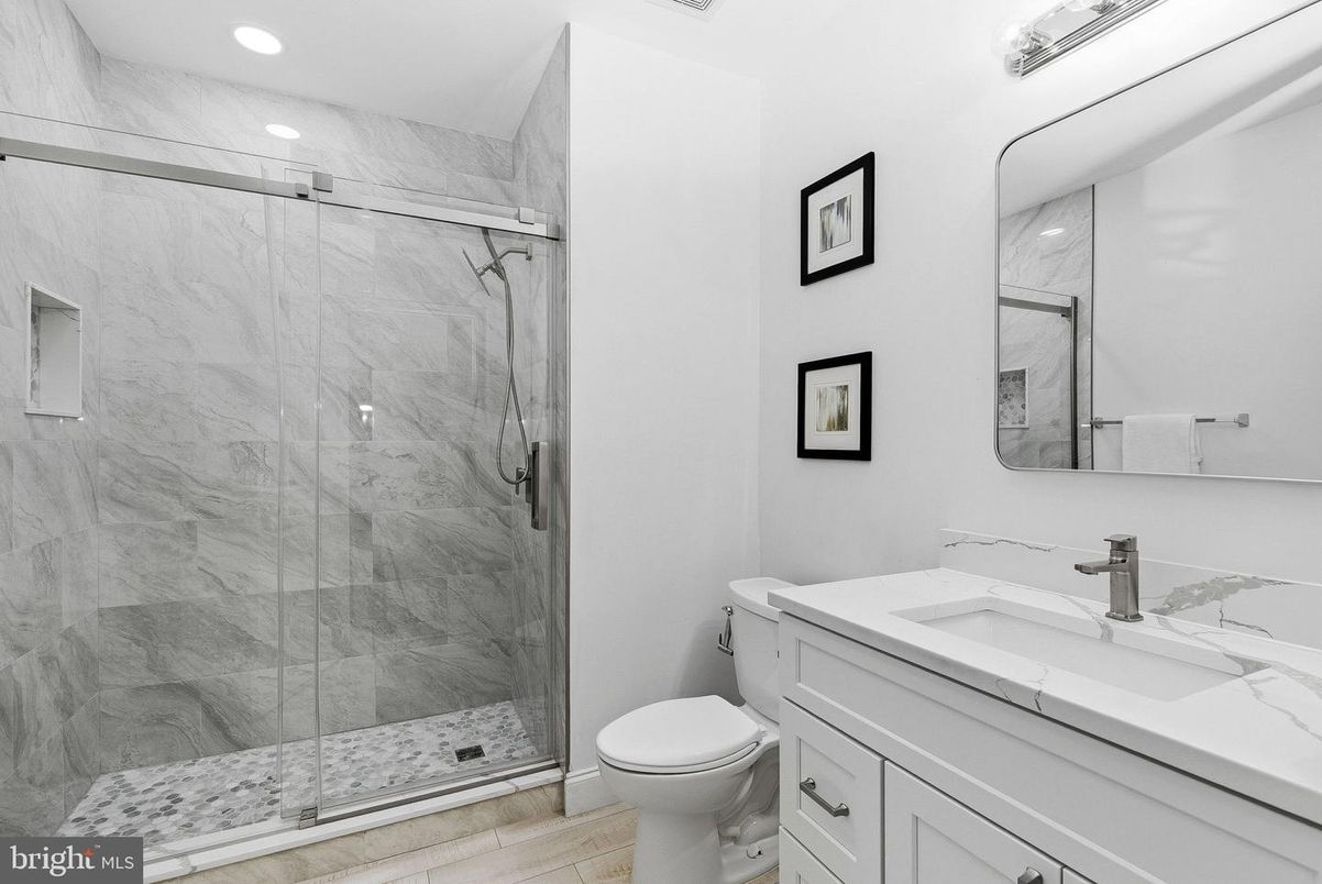 Bathroom, Glass Shower, Interior, Marble Walls, Recessed Lighting, Wood Texture Flooring