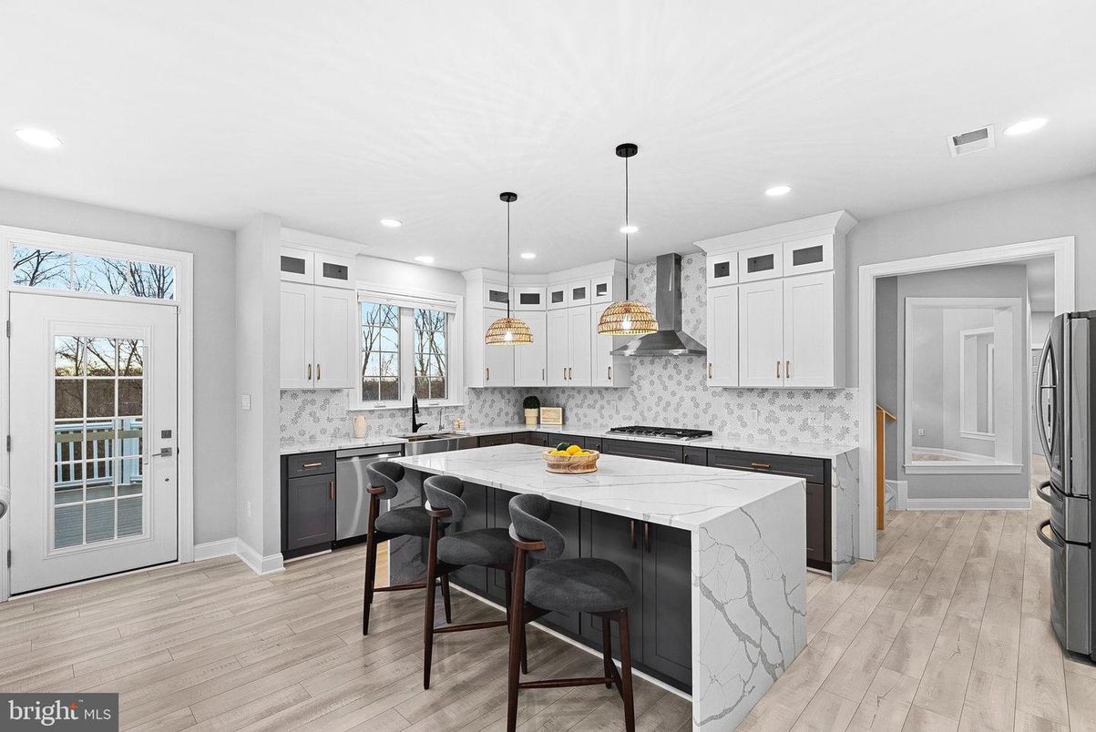 Interior, Kitchen, Marble Walls, Pendant Lights, Recessed Lighting, Stainless Steel Appliances, Wood Texture Flooring