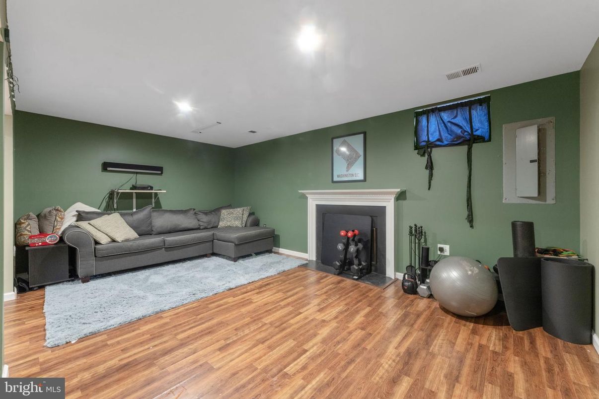 Fireplace, Fitness Equipment, Interior, Recessed Lighting, Wood Texture Flooring