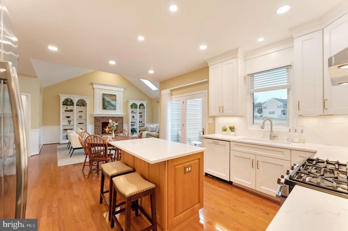Dining room, Fireplace, Interior, Kitchen, Recessed Lighting, Wood Texture Flooring