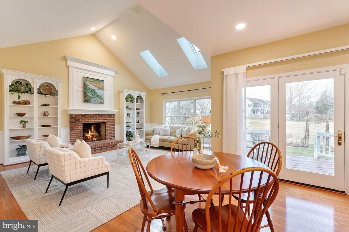 Dining room, Fireplace, Interior, Living room, Recessed Lighting, Wood Texture Flooring