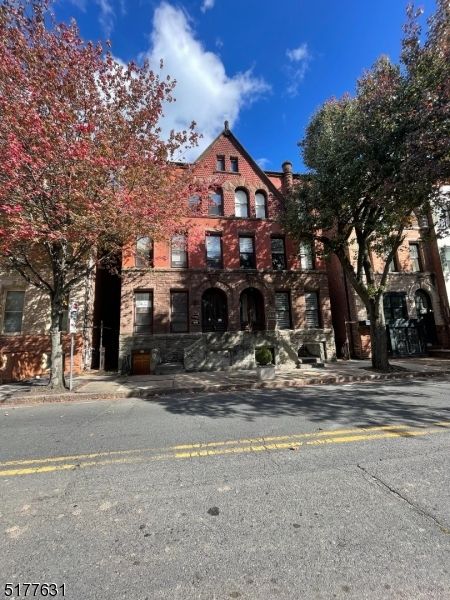 Exterior, Facade, Brick Facade, Condo Building