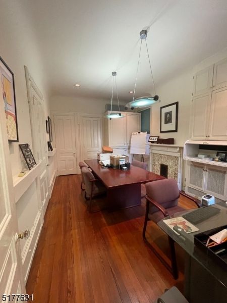 Dining room, Fireplace, Interior, Living room, Pendant Lights, Recessed Lighting, Wood Texture Flooring