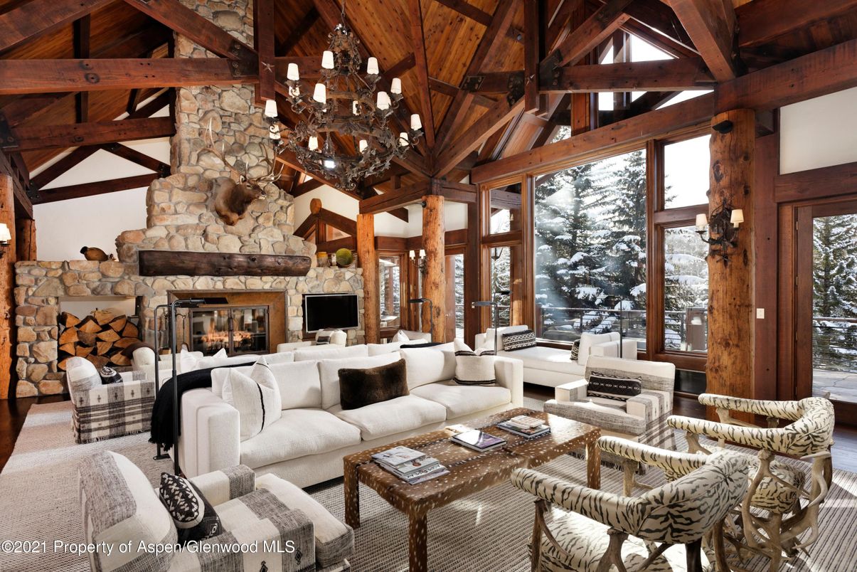 Chandelier, Fireplace, Interior, Living room, Stone Walls, Wooden Beams, Wooden Ceilings, Wood Texture Flooring