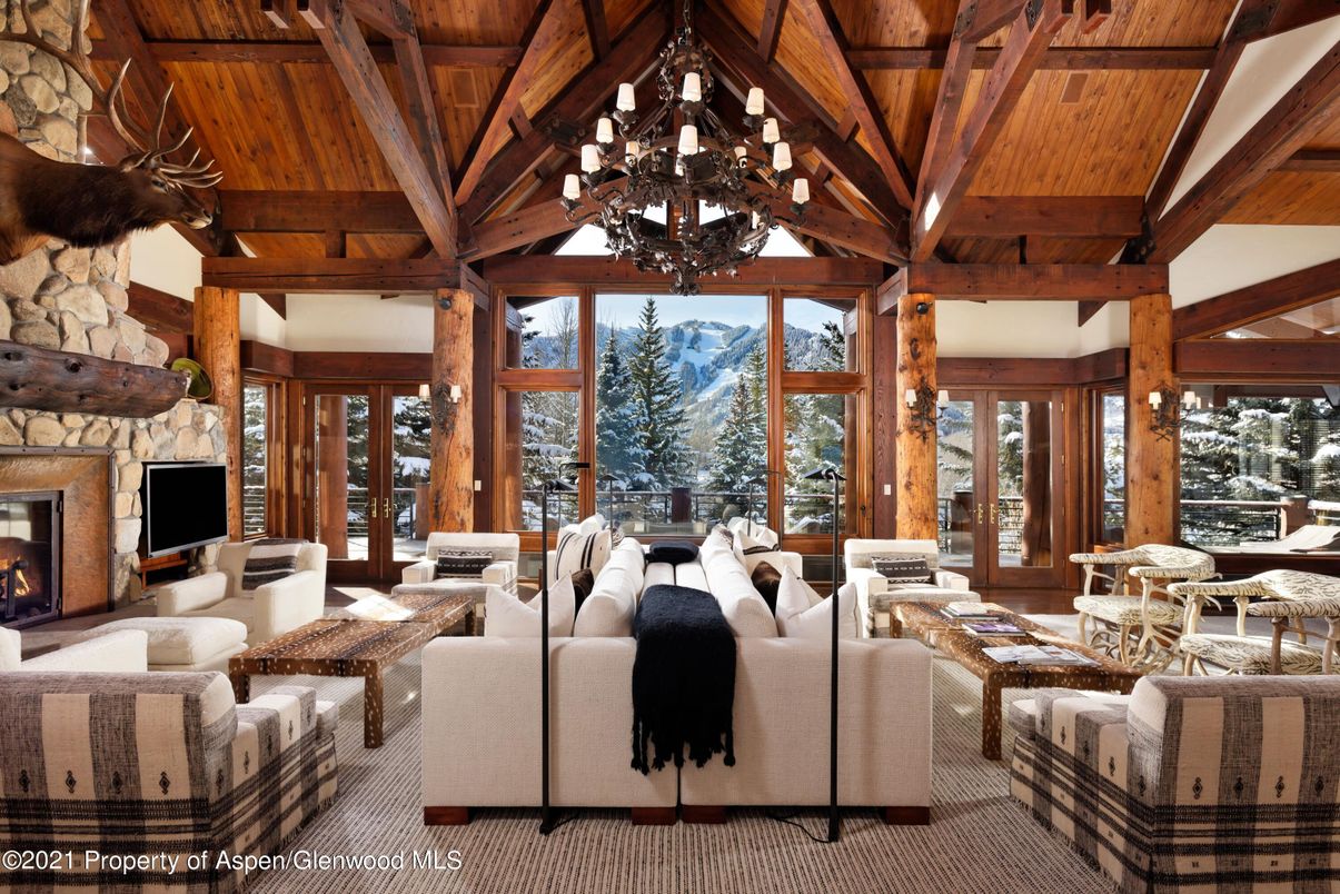 Chandelier, Fireplace, Interior, Living room, Stone Walls, Wooden Beams, Wooden Ceilings