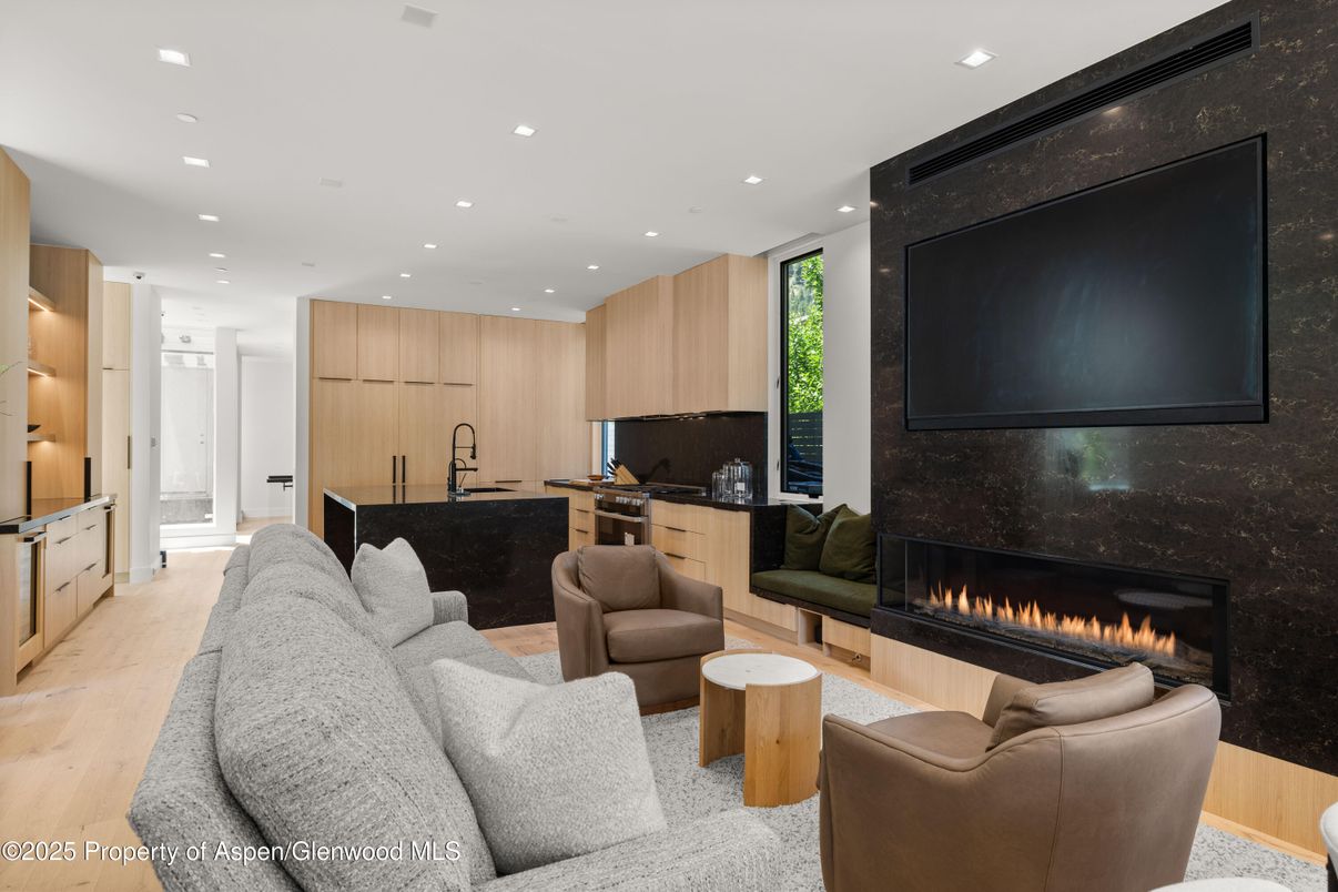 Fireplace, Interior, Kitchen, Living room, Recessed Lighting, Wood Texture Flooring