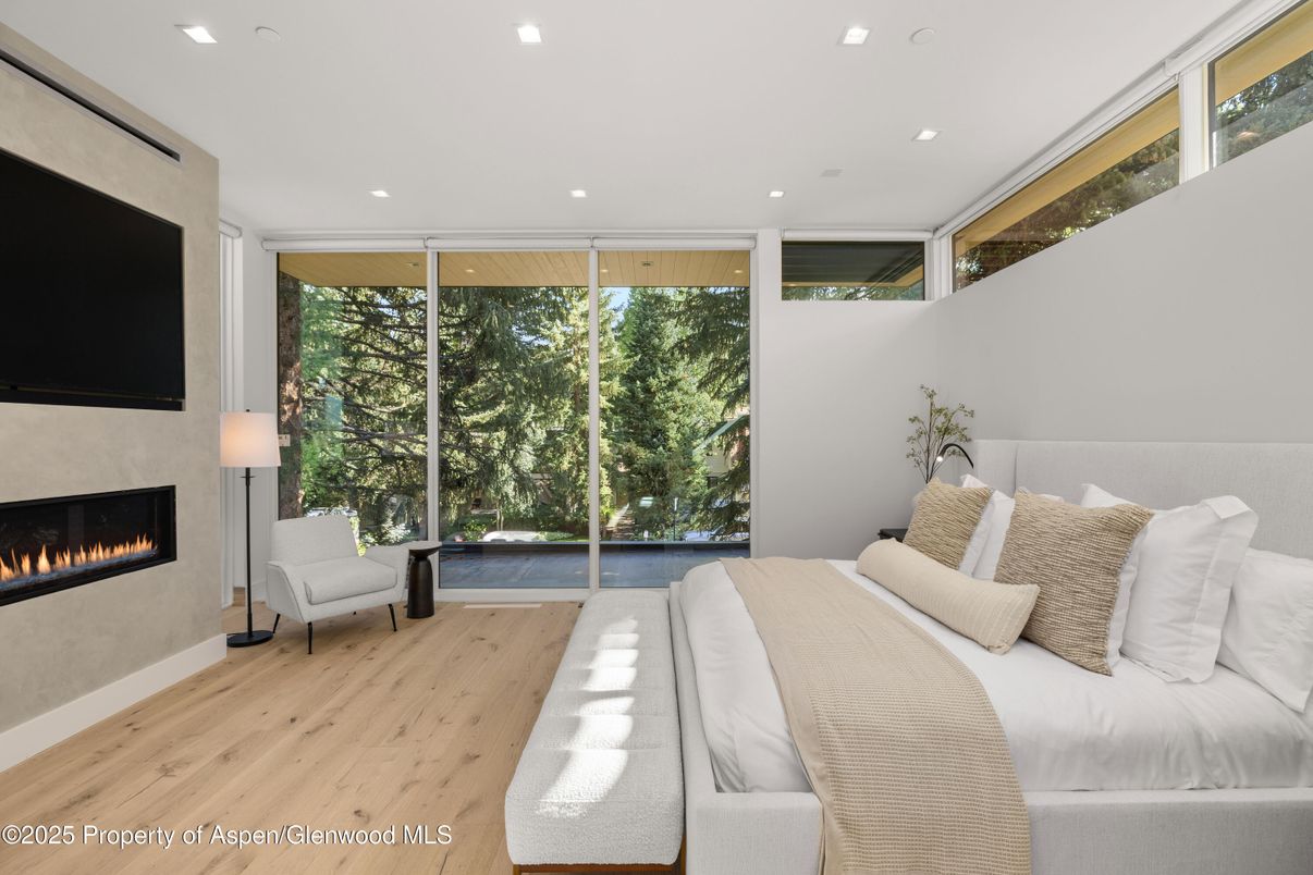 Bedroom, Fireplace, Interior, Recessed Lighting, Wood Texture Flooring