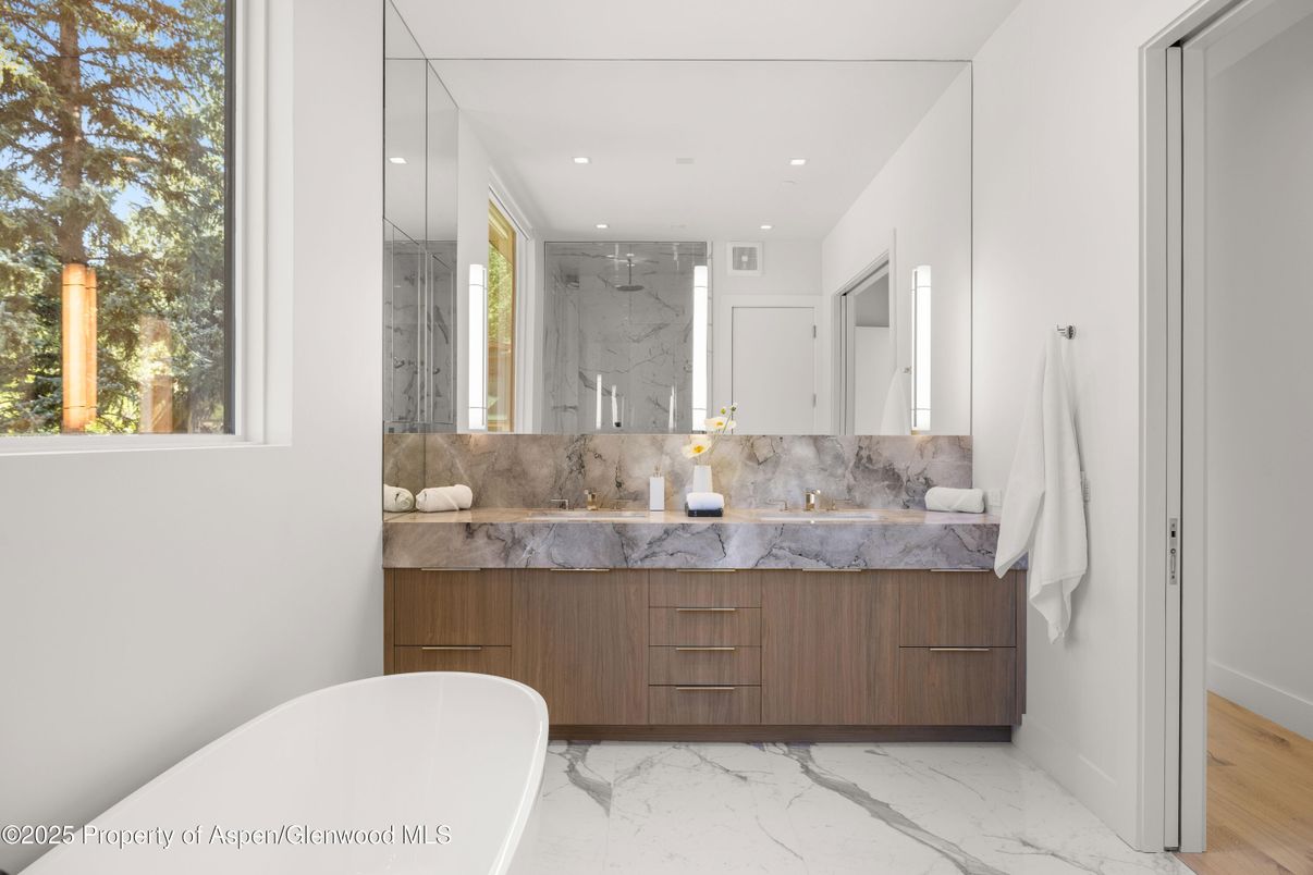 Bathroom, Dual Sink Vanities, Free Standing Baths, Interior, Marble, Marble Walls, Recessed Lighting