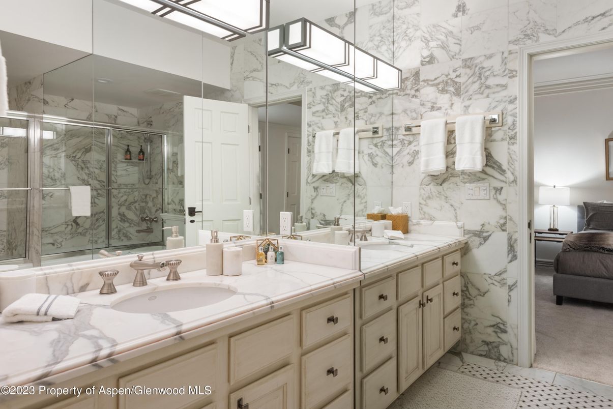 Bathroom, Dual Sink Vanities, Glass Shower, Interior, Marble Walls