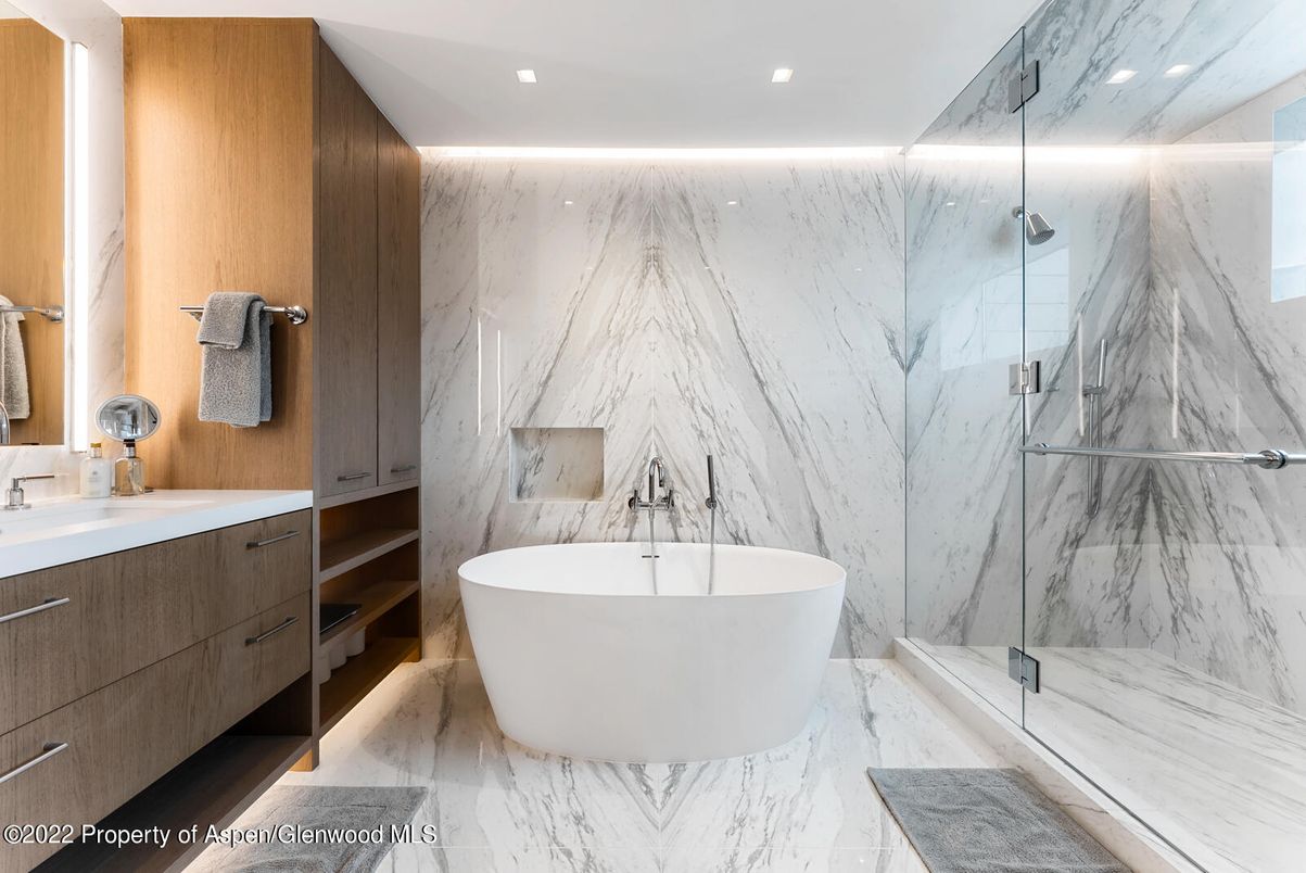 Bathroom, Free Standing Baths, Glass Shower, Interior, Marble, Marble Walls, Recessed Lighting