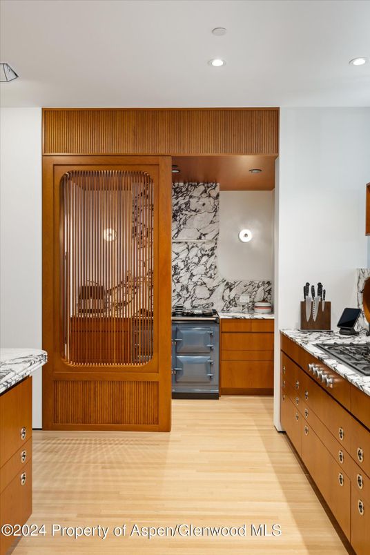 Interior, Kitchen, Marble Walls, Recessed Lighting, Wood Texture Flooring