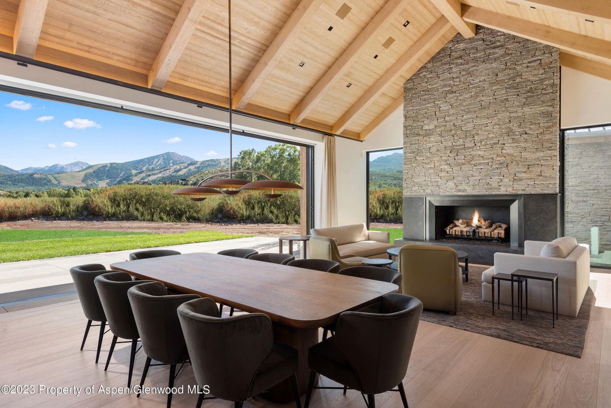 Dining room, Fireplace, Interior, Living room, Recessed Lighting, Stone Walls, Wooden Beams, Wooden Ceilings, Wood Texture Flooring