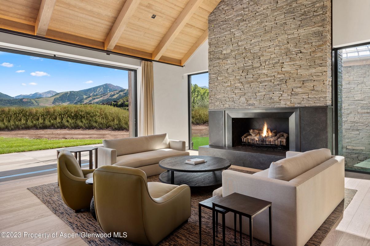 Fireplace, Interior, Living room, Recessed Lighting, Stone Walls, Wooden Beams, Wooden Ceilings, Wood Texture Flooring