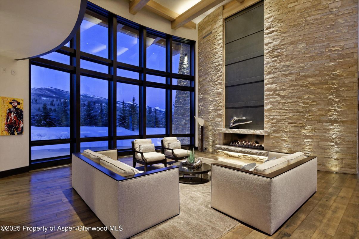 Fireplace, Interior, Living room, Recessed Lighting, Stone Walls, Wood Texture Flooring