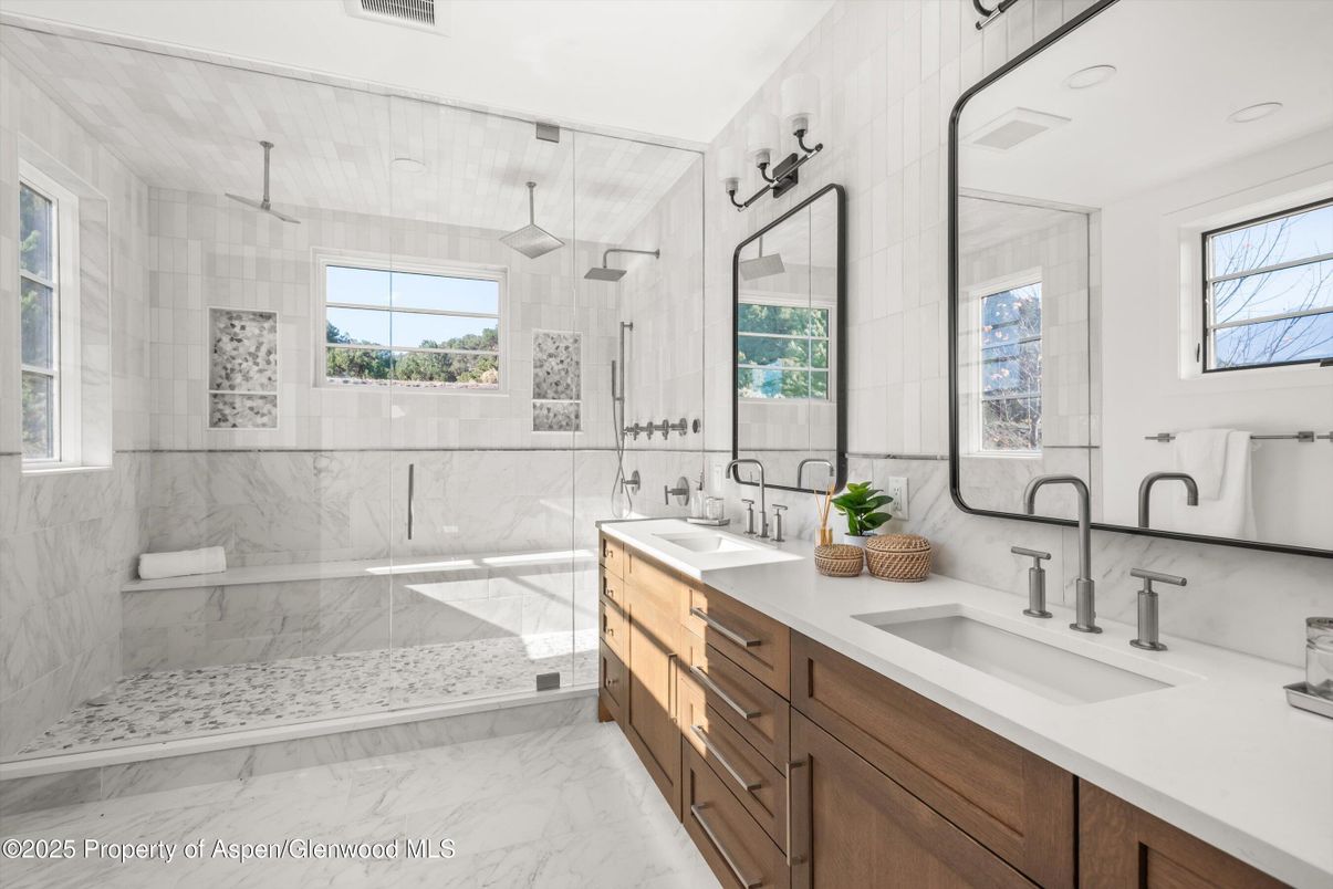 Bathroom, Dual Sink Vanities, Glass Shower, Interior, Marble, Marble Walls, Recessed Lighting