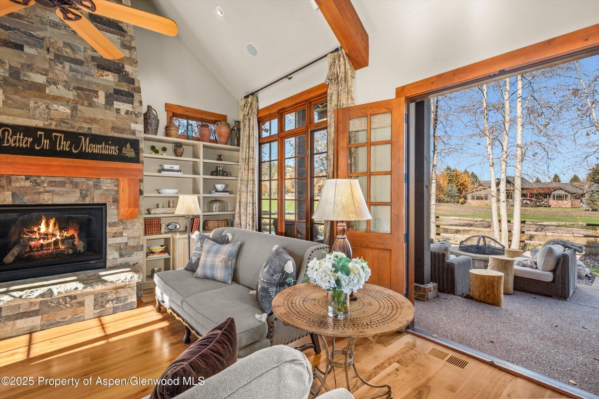 Fireplace, Interior, Living room, Recessed Lighting, Stone Walls, Wooden Beams, Wood Texture Flooring