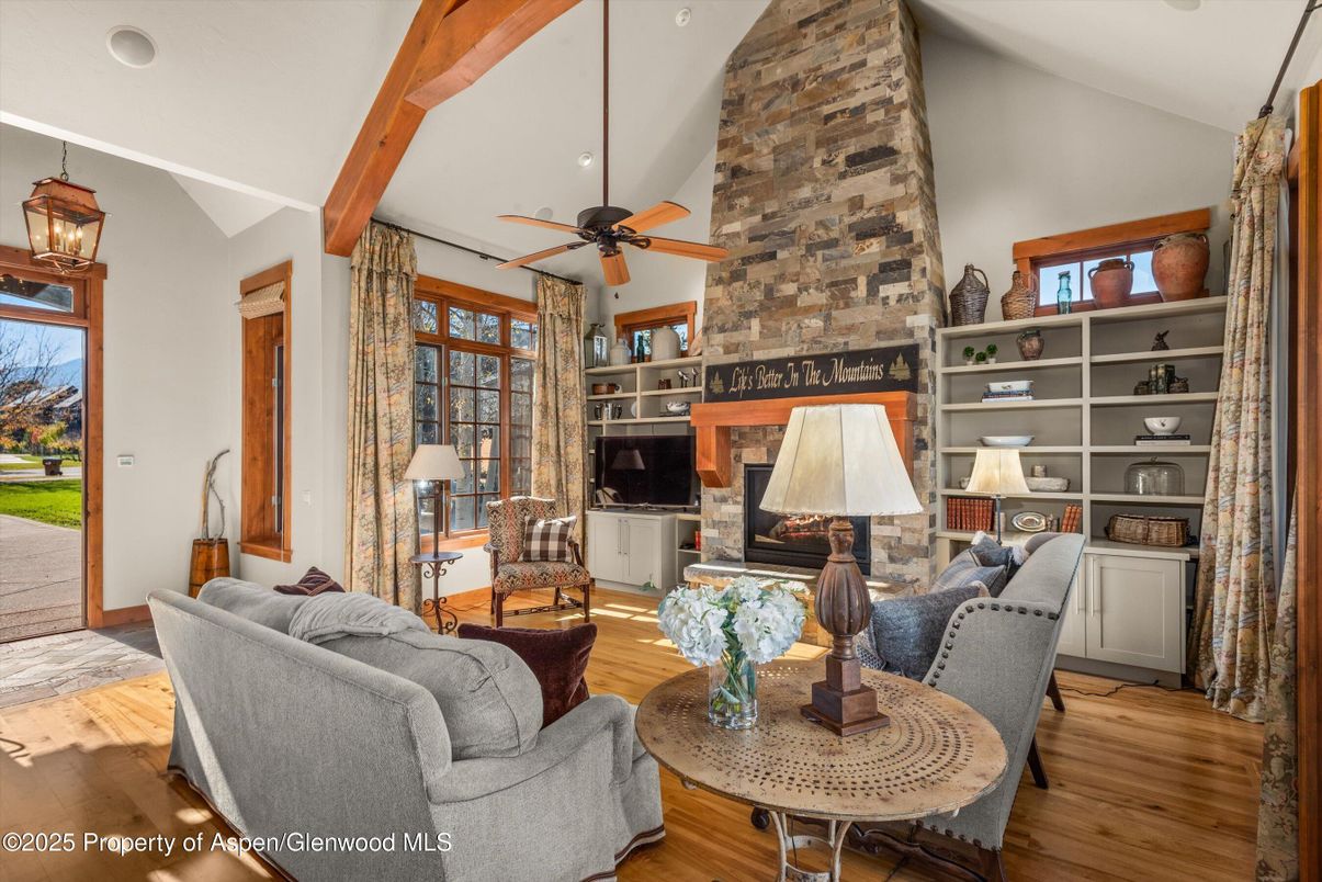 Fireplace, Interior, Living room, Recessed Lighting, Stone Walls, Wooden Beams, Wood Texture Flooring