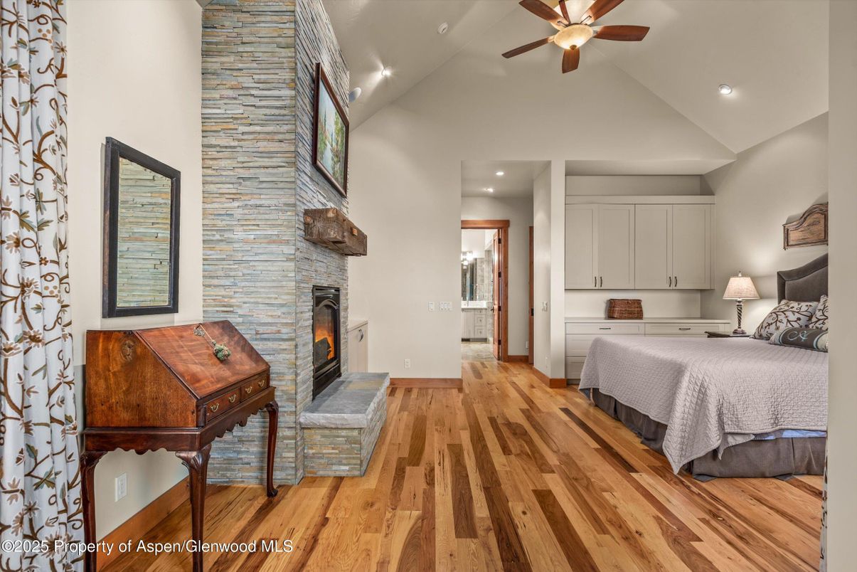 Bedroom, Fireplace, Interior, Recessed Lighting, Wood Texture Flooring