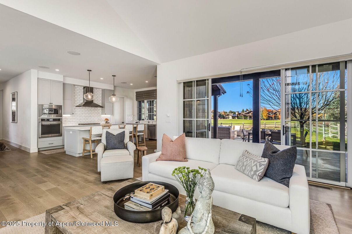Dining room, Interior, Kitchen, Living room, Pendant Lights, Recessed Lighting, Stainless Steel Appliances, Wood Texture Flooring