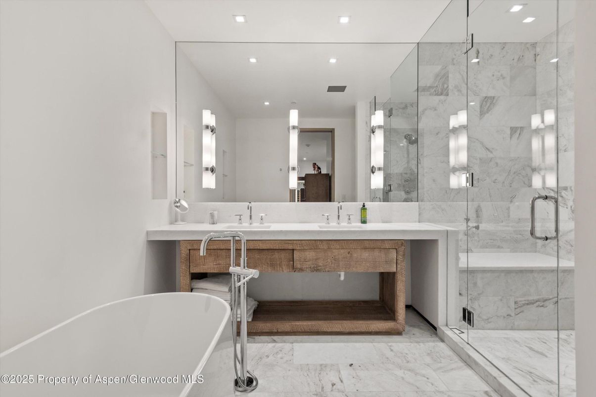 Bathroom, Dual Sink Vanities, Free Standing Baths, Glass Shower, Interior, Marble, Marble Walls, Recessed Lighting