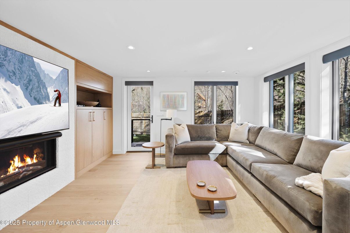 Fireplace, Interior, Living room, Recessed Lighting, Wood Texture Flooring