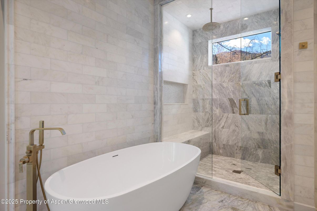 Bathroom, Free Standing Baths, Glass Shower, Interior, Marble Walls, Recessed Lighting