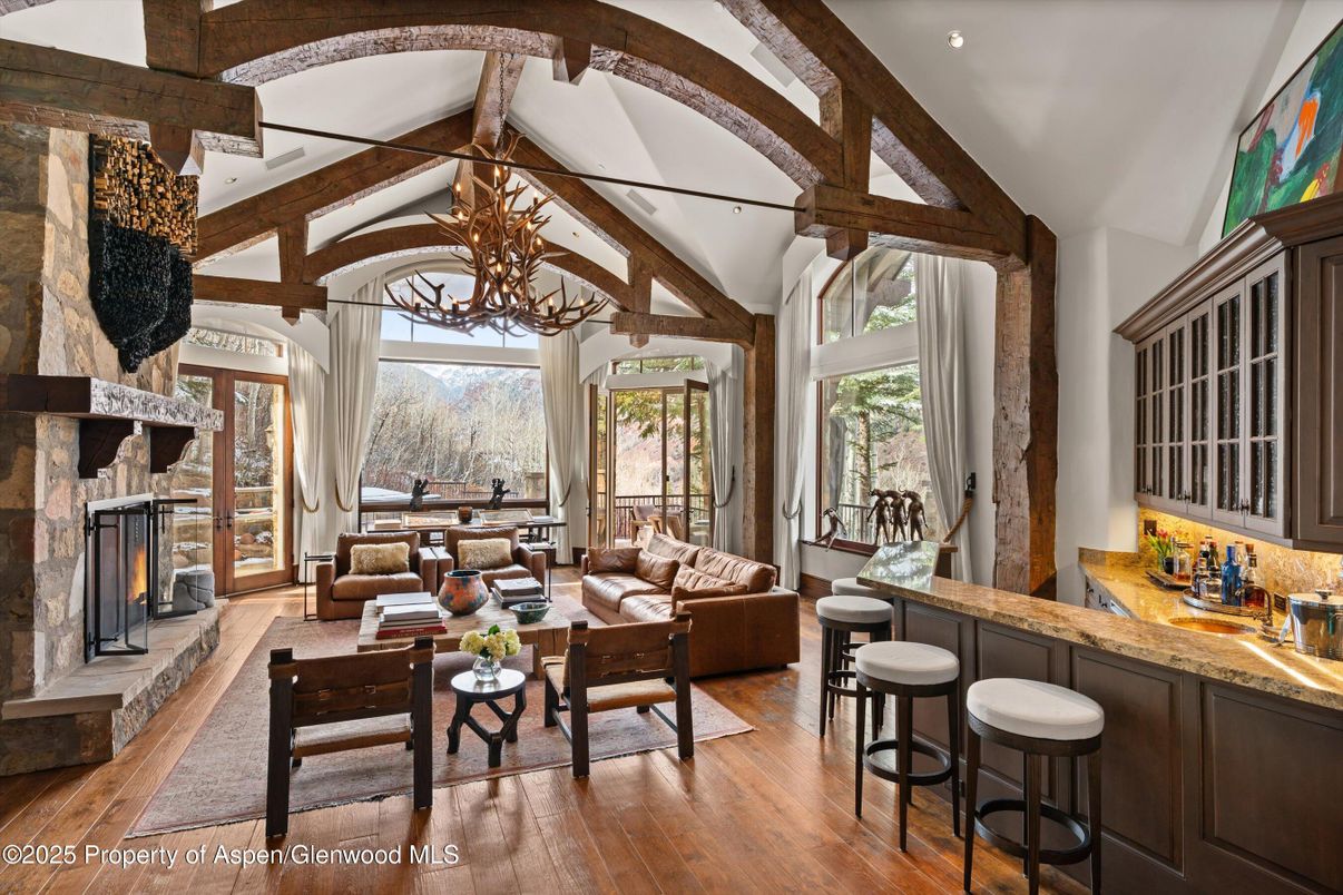 Chandelier, Fireplace, Interior, Living room, Recessed Lighting, Wooden Beams, Wood Texture Flooring