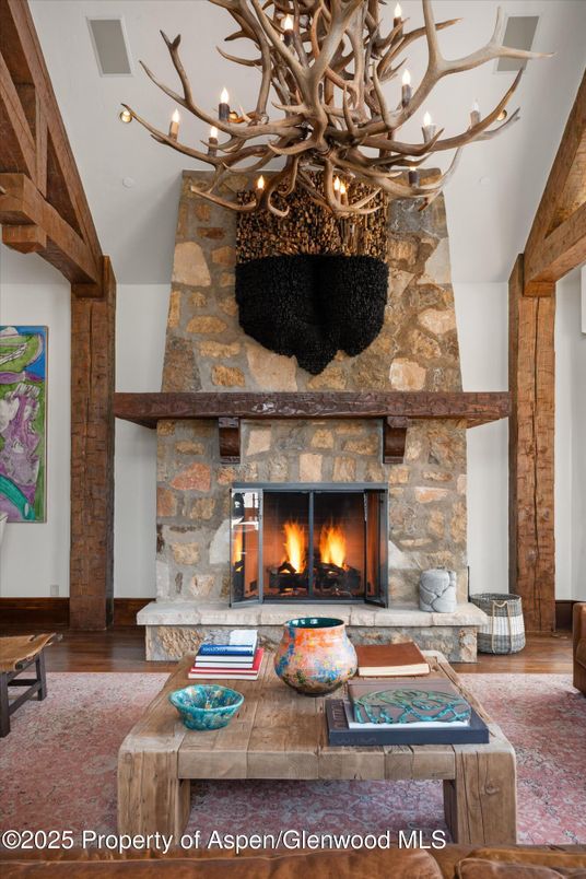 Chandelier, Fireplace, Interior, Living room, Stone Walls, Wood Texture Flooring