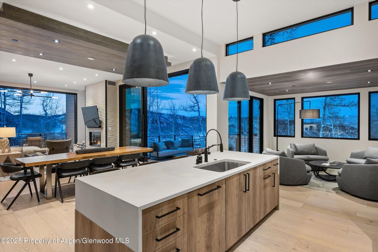 Dining room, Fireplace, Interior, Kitchen, Living room, Pendant Lights, Recessed Lighting, Wooden Ceilings, Wood Texture Flooring