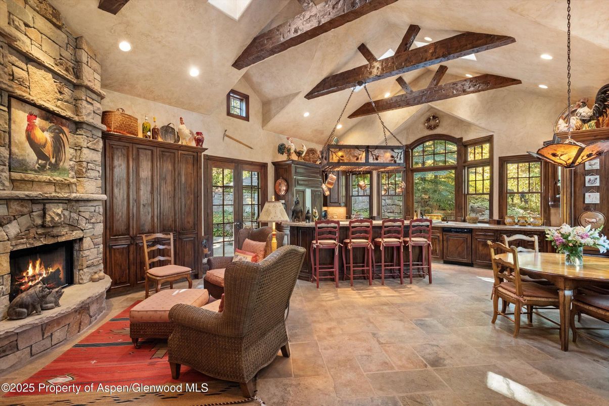 Dining room, Fireplace, Interior, Living room, Pendant Lights, Recessed Lighting, Stone Walls, Wooden Beams