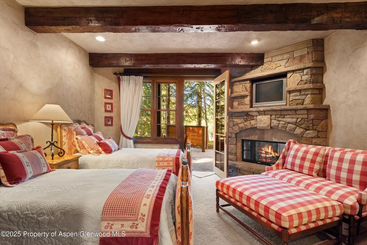 Bedroom, Fireplace, Interior, Recessed Lighting, Stone Walls, Wooden Beams
