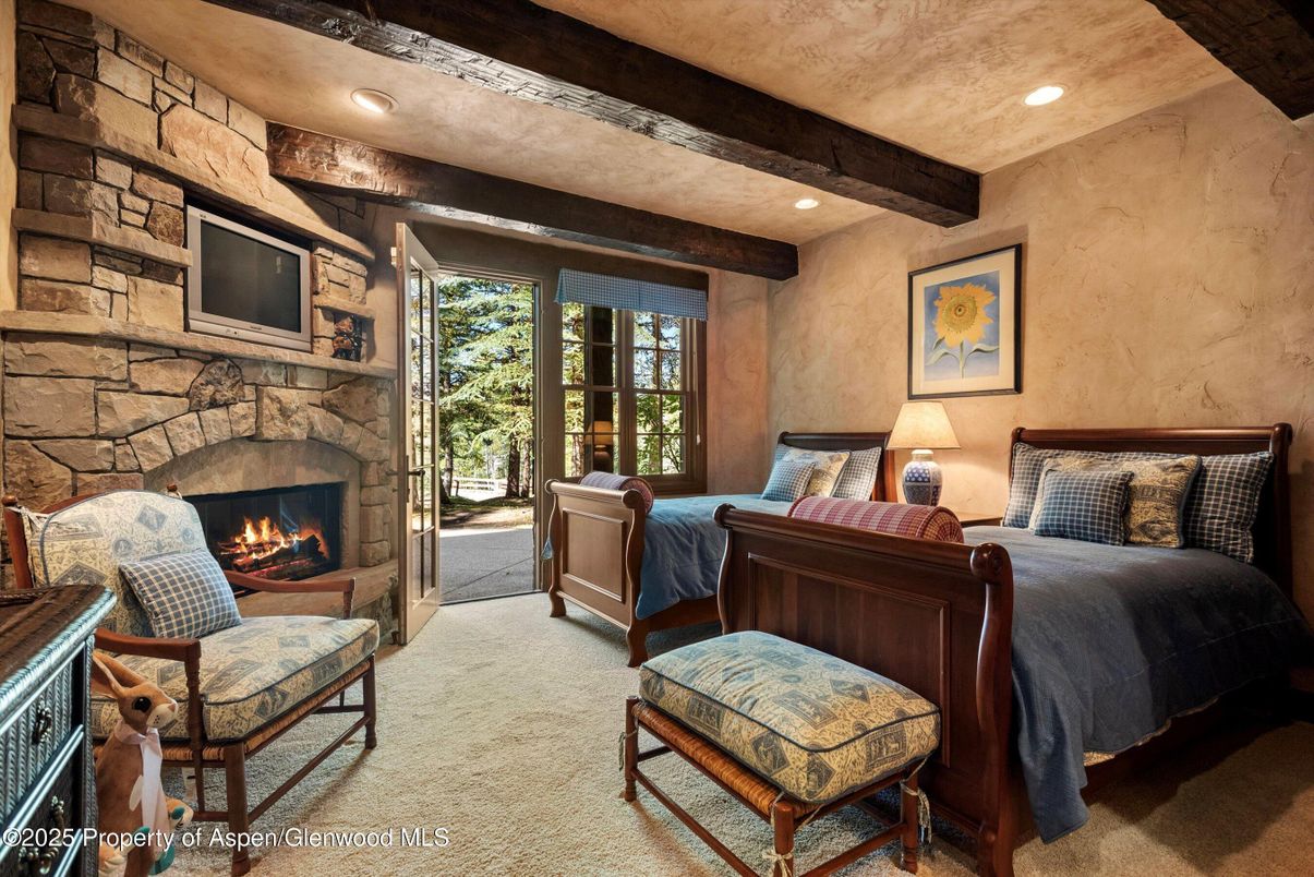 Bedroom, Fireplace, Interior, Recessed Lighting, Stone Walls, Wooden Beams