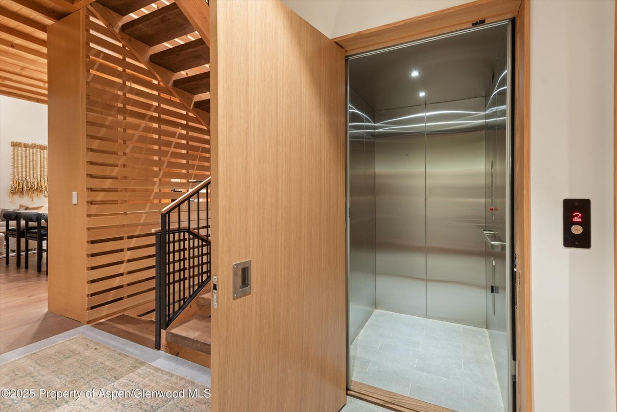 Elevator, Interior, Recessed Lighting, Wood Texture Flooring, Wooden Walls