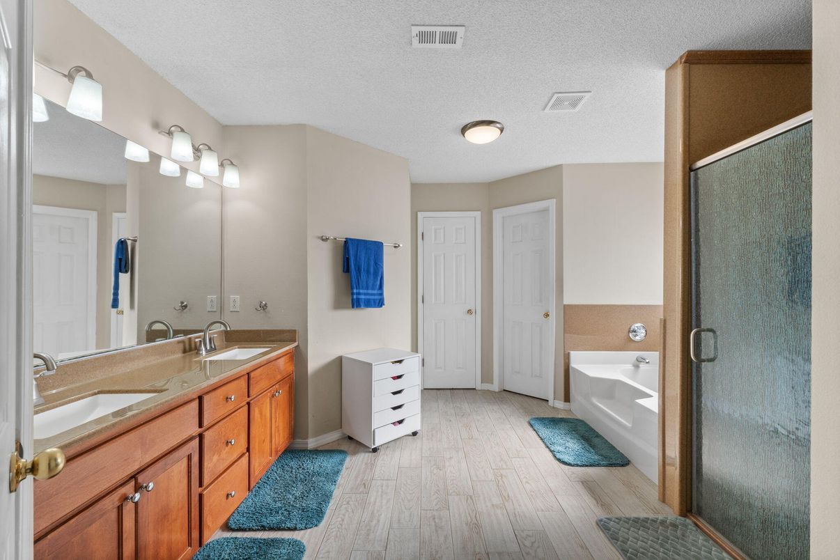 Bathroom, Dual Sink Vanities, Glass Shower, Interior, Wood Texture Flooring