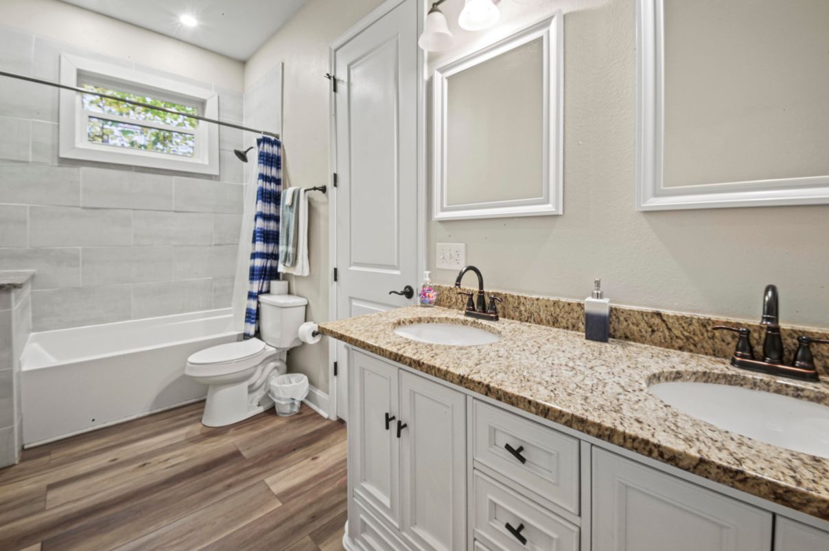 Bathroom, Dual Sink Vanities, Interior, Recessed Lighting, Wood Texture Flooring