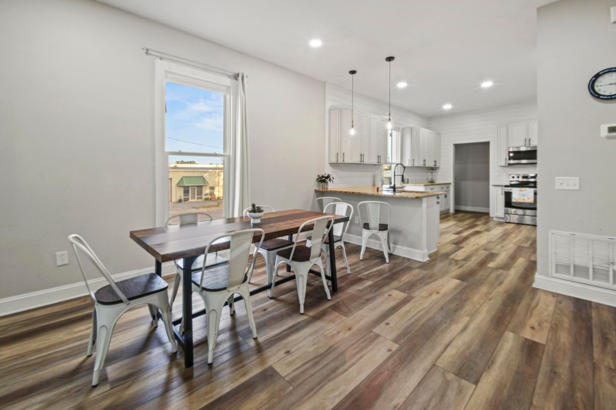 Dining room, Interior, Kitchen, Pendant Lights, Recessed Lighting, Stainless Steel Appliances, Wood Texture Flooring