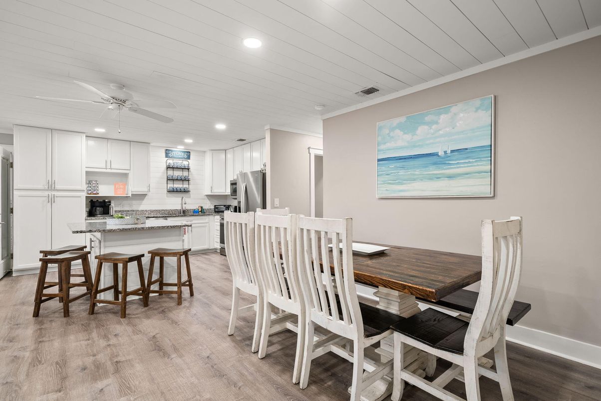 Dining room, Interior, Kitchen, Pendant Lights, Recessed Lighting, Stainless Steel Appliances, Wood Texture Flooring