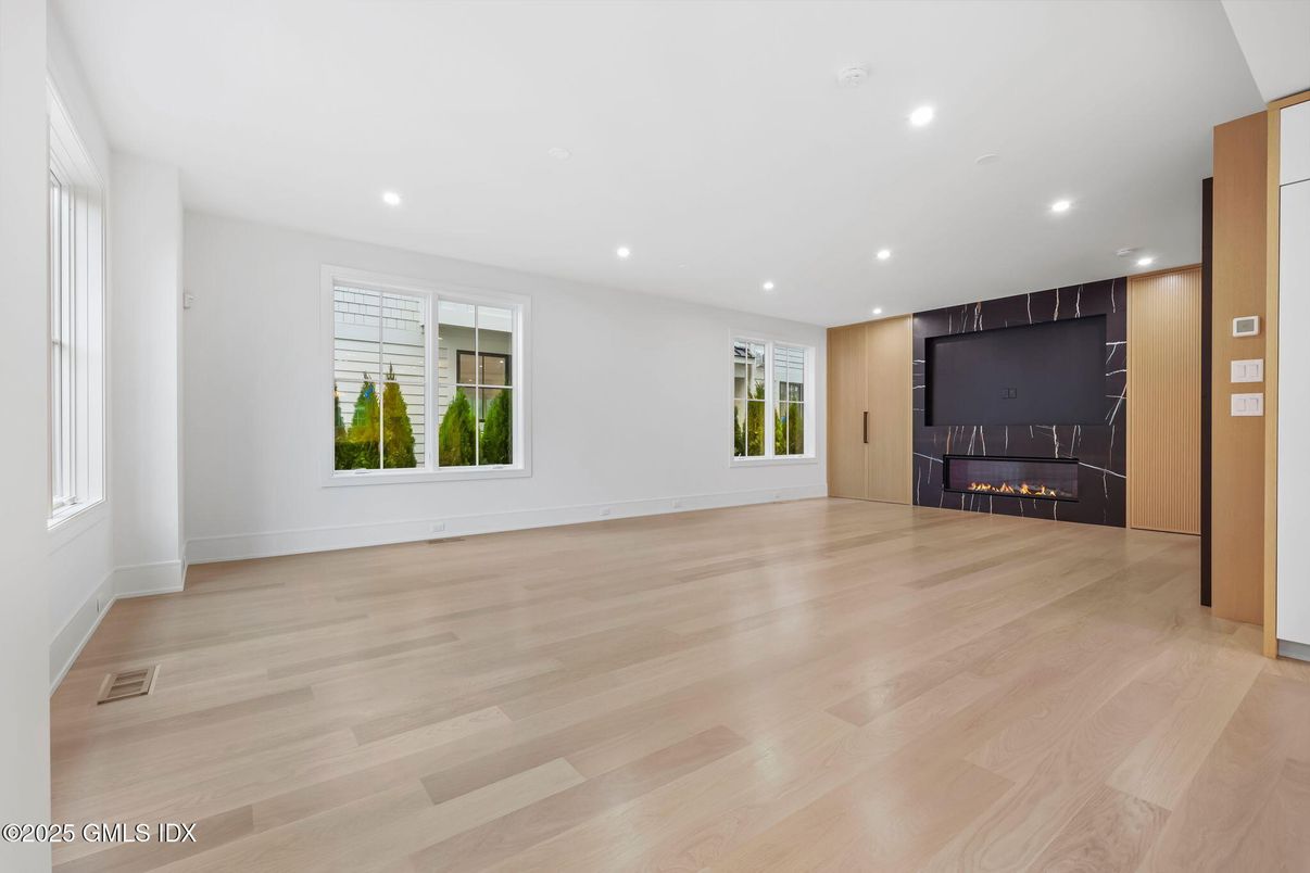 Empty room, Fireplace, Interior, Recessed Lighting, Wood Texture Flooring