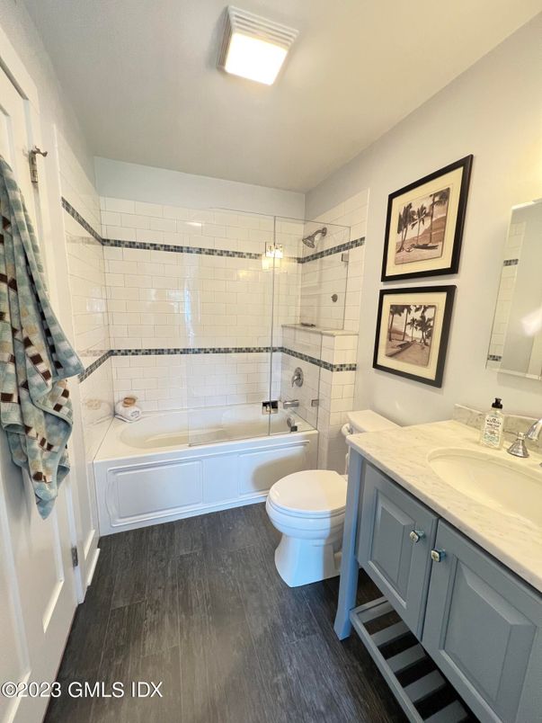 Bathroom, Dual Sink Vanities, Glass Shower, Interior, Wood Texture Flooring